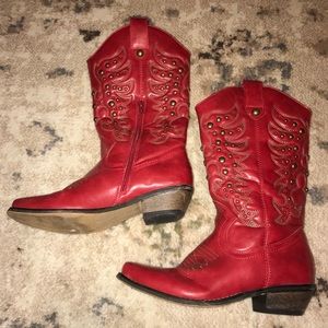 Woman’s red boots